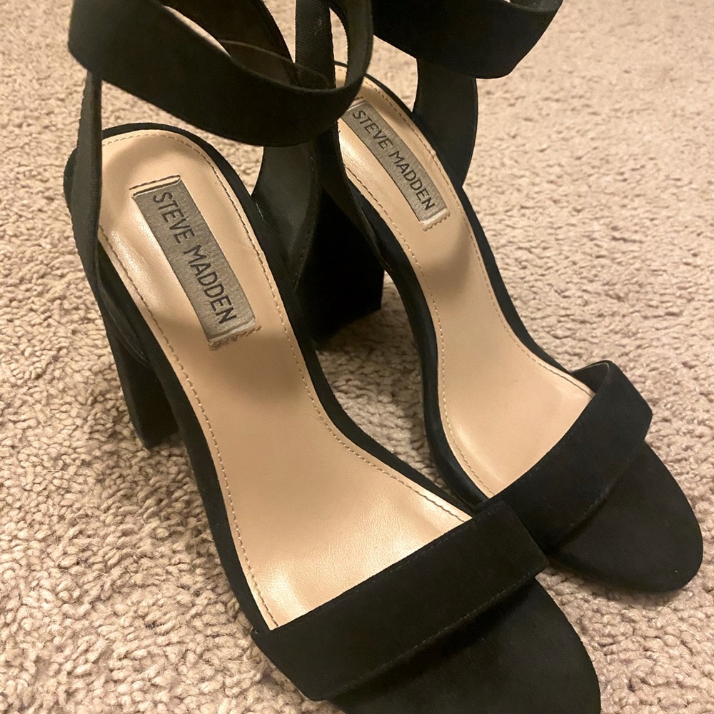 Steve Madden black high heels.